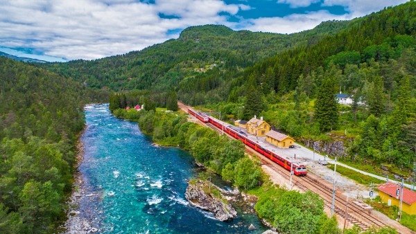 Immerse yourself in Oslo and embark on a scenic rail journey with Alastair Miller